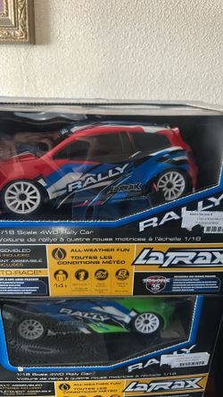 two traxxas rally ready to run 1/18