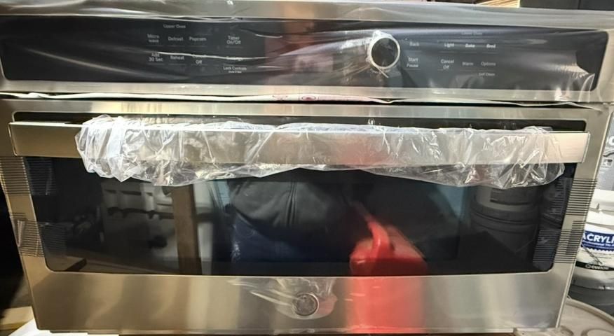 GE Over-the-range Microwave-stainless Steel Model JVM7195SKSS Brand new (open Box)