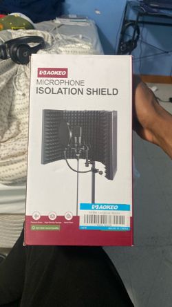 Microphone isolation shield