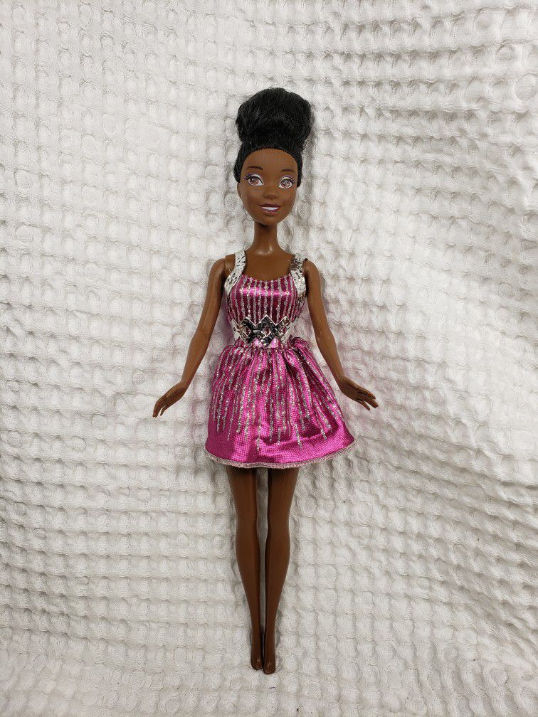 Disney princess Tiana 11 1/2" .  Doll is in good condition. 