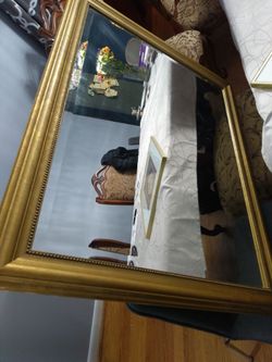 Fancy gold framed mirror