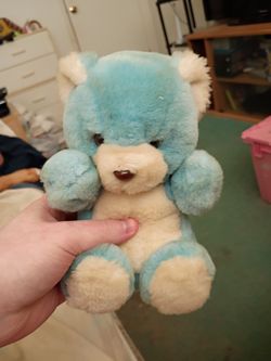 A Light Blue and White teddy bear plush toy