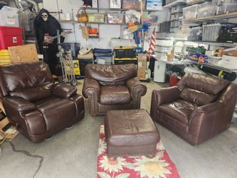 Leather chair (3) living room set with ottoman.