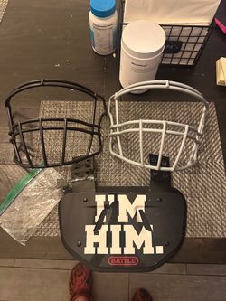 Football equipment face mask and pads