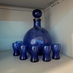 Round decanter, and shot glasses