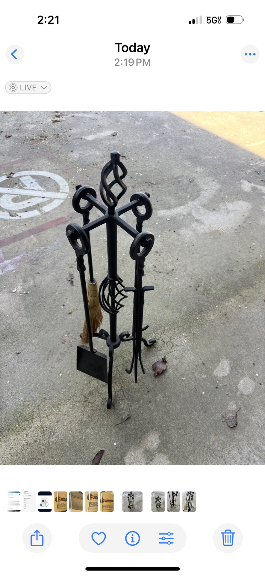 five-piece wrought iron fireplace tool set with a black finish