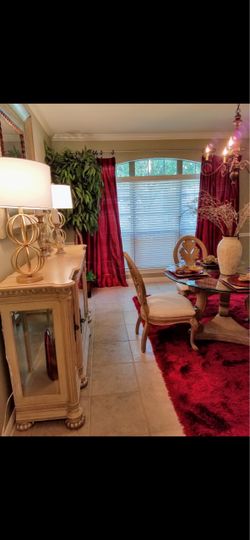 Nice glass table, rug and buffet