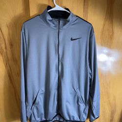This is a Nike Dri-FIT Epic Knit Training Jacket in grey and black.
