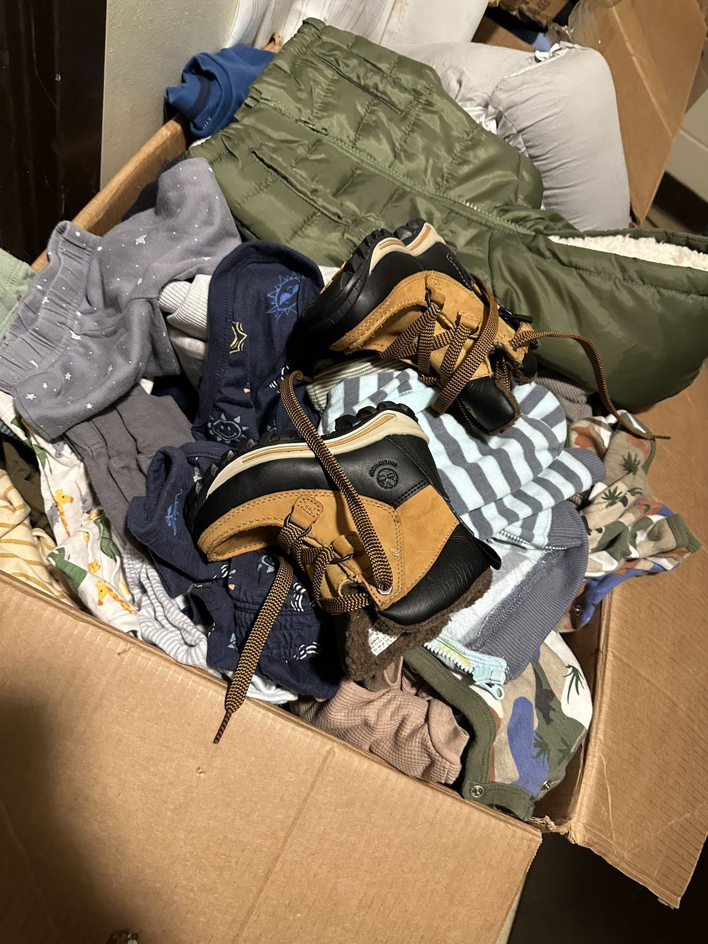 Baby boy clothing 0-3 and 3 and 12 months a lot and lounger bed