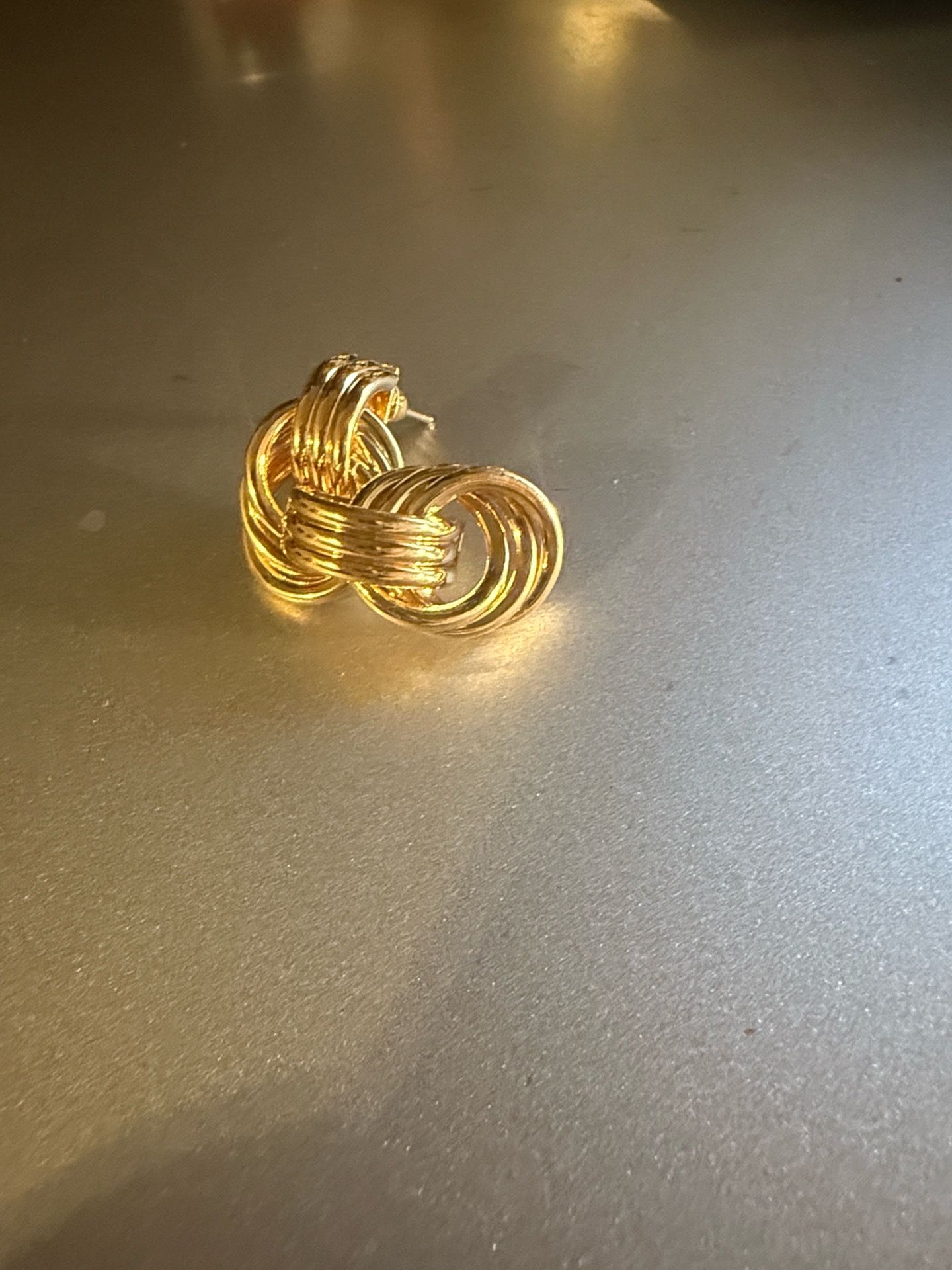 Gold tone earrings