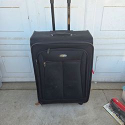 Large Samsonite 4 wheel Rolling luggage!