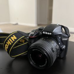 Nikon D3300 Digital SLR with 24.2 Megapixels and 18-55mm Lens Included (With Original Nikon Bag)