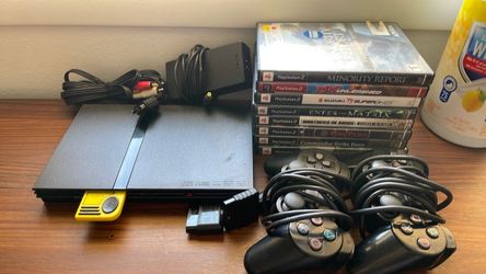 Playstation 2 Lot - one console, games, two controllers