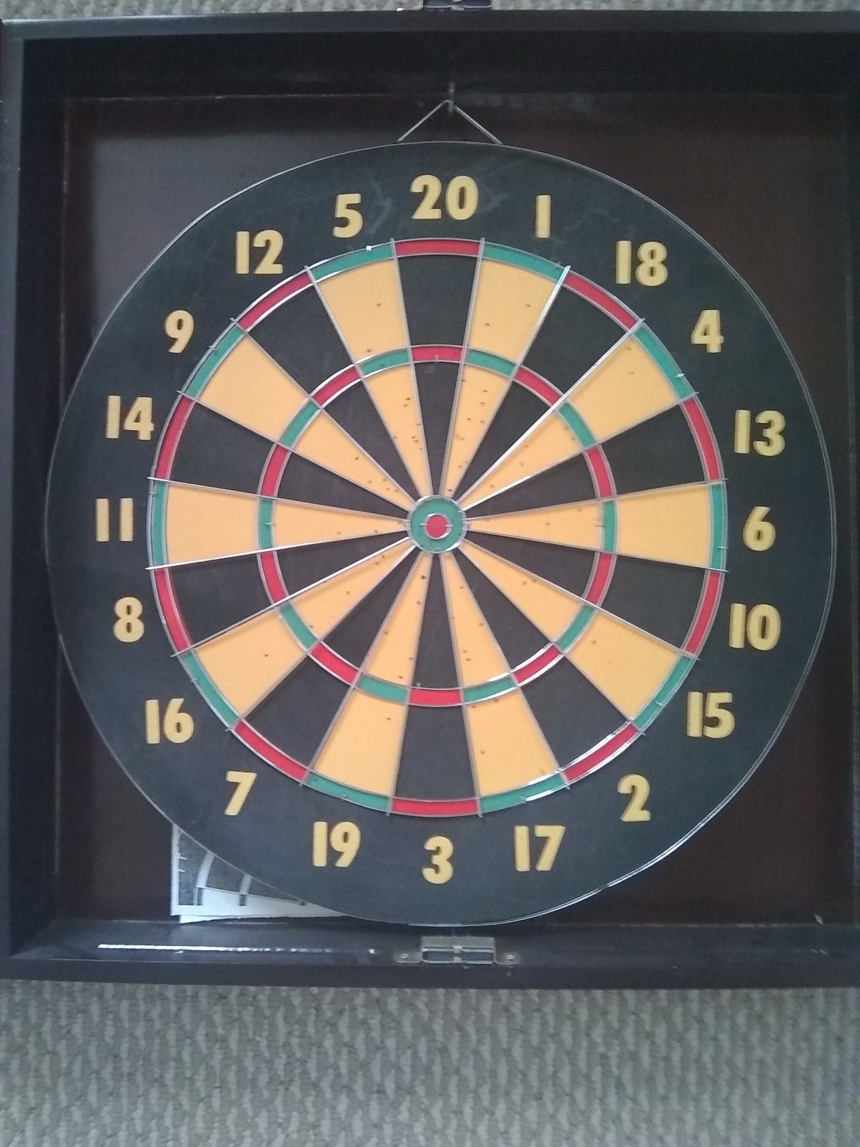 Dart board in Walnut finish cabinet