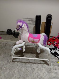Child stuffed riding horse