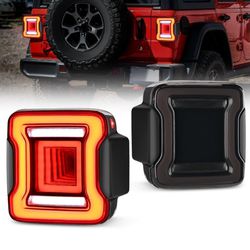 New in the box 2018 - 2023 Jeep Wrangler JL Smoked Tail Light