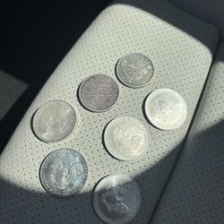 7-Piece 1 oz Fine Silver Coin Collection – Silver Eagles, Trade Dollar & Millennial Trade Unit