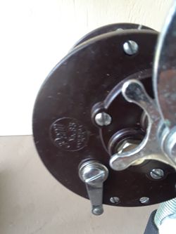 Vintage Penn No.85 open reel on a fishing pole. Used in Fresh water only