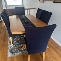 Extend Table and 6 Chairs.