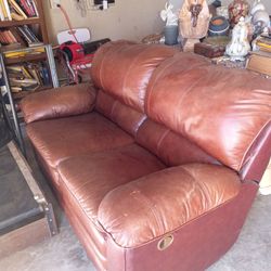 LEATHER  LOVE SEAT.  GOOD COND