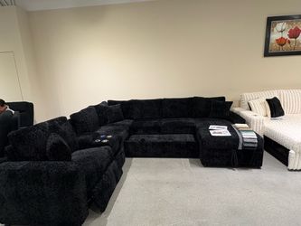 New Sectional Black color power recliner and pullout bed