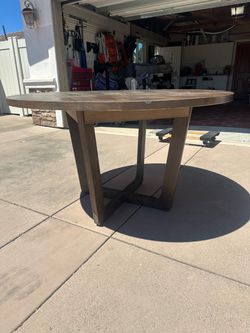 Round Dark wood dining table