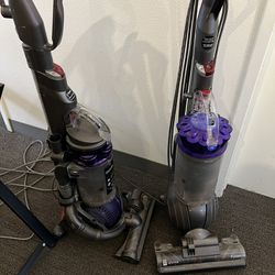 Two Dyson Vacuums