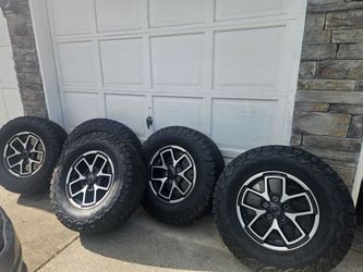 Awesome condition jeep wrangler wheels and tires