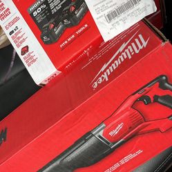 Milwaukee Battery + Charger + Sawzall (LIKE NEW)