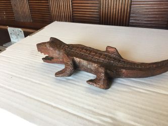 Hand carved wood reptile
