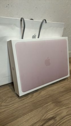 Mac book neo blush pink, 8GB, 512B storage.