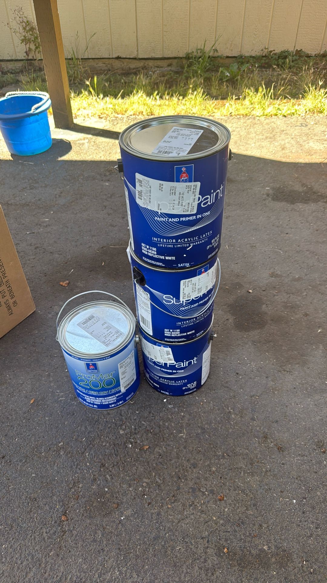 three new gallons of paint