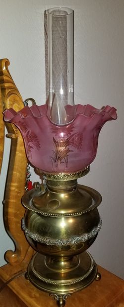 Antique Brass Electrified Oil Lamp With Cranberry Tulip Edge Shade