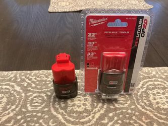 2 Milwaukee M12 Batteries 1- brand new 2 AH and 1 - 1.5 AH.
