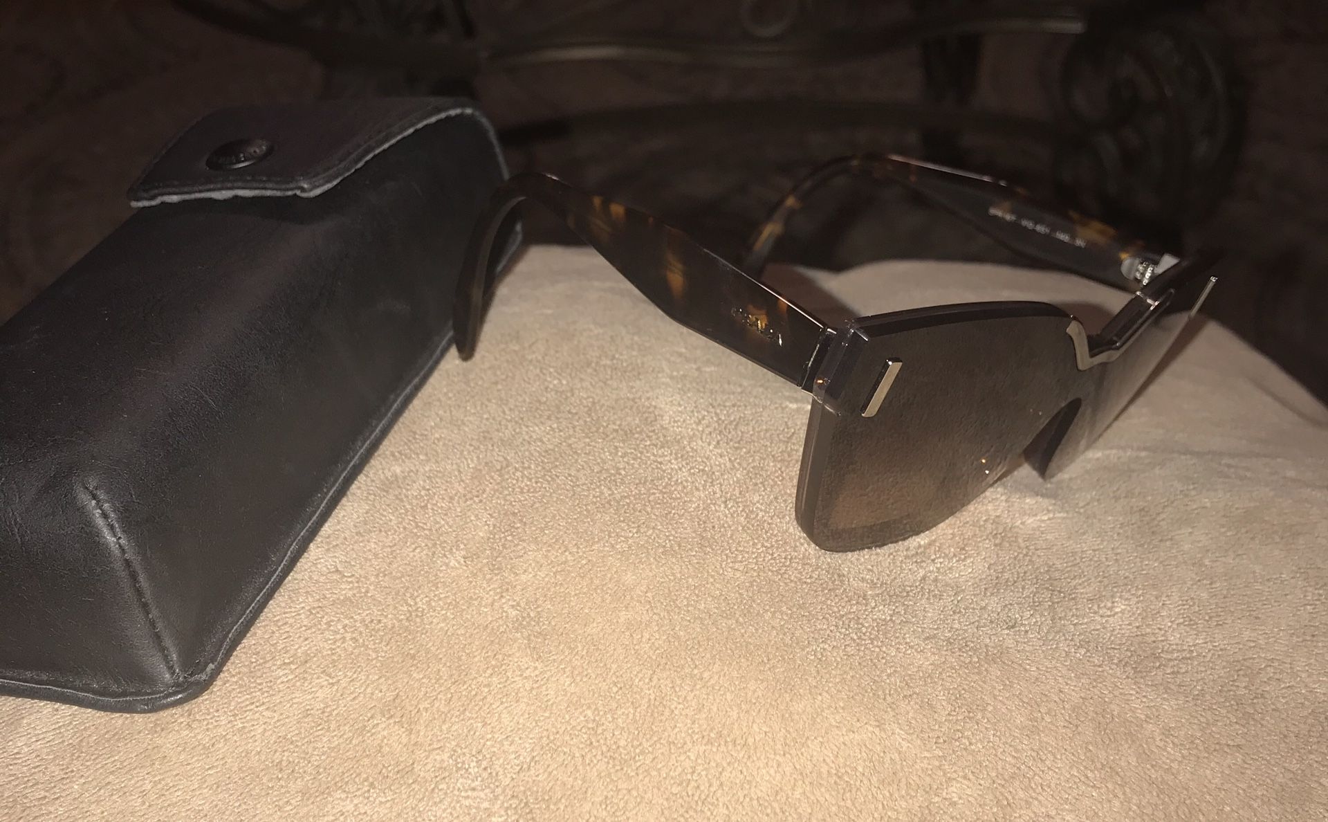 Original Prada ladies sunglasses with case.New never used