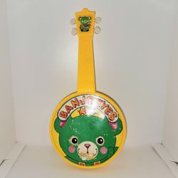 Vintage 1982 Shelcore Banjo Eyes musical toy banjo in working condition 