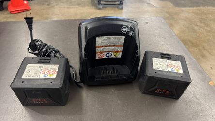 Set of STIHL 36v 1.4ah batteries and charger nothing sold separate no trades pick up in Tacoma FIRM PRICE 
