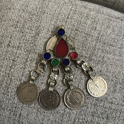 Antique Iranian coin pendant.