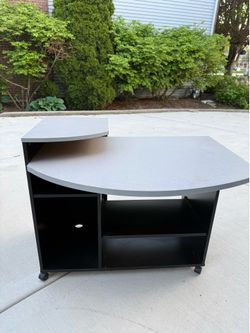 Gray rolling office desk with monitor platform