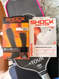 Shock doctor compression socks and arm sleeve