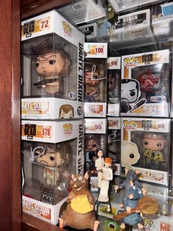 24 Signed Walking Dead Funko Pop Figures and 1 Freddy Funko as Daryl Dixon