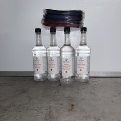 4 - 1 liter bottles of hand sanitizer and 36 masks