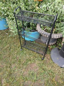 Metal 3 Baskets with wheels it dose come apart like New