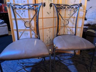 Ride iron chairs with leather seats