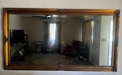 Wood frame gold finish mirror