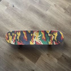 supreme skateboard with dgk griptape