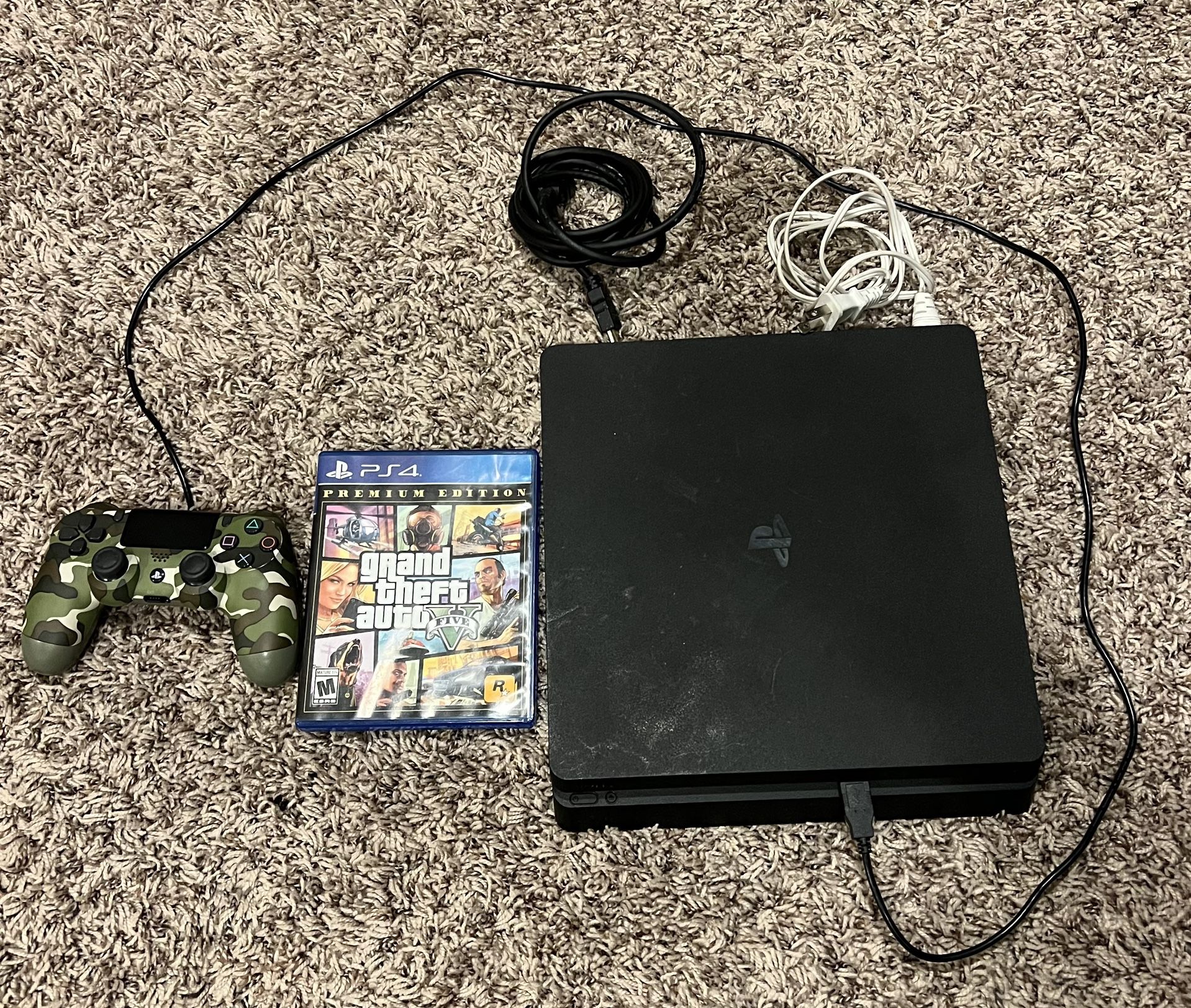 PS4 1TB with DUALSHOCK 4 wireless controller & GTA 5 Premium Edition 