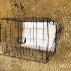 A Medium Size, Small Cage For A Medium Or Small Dog