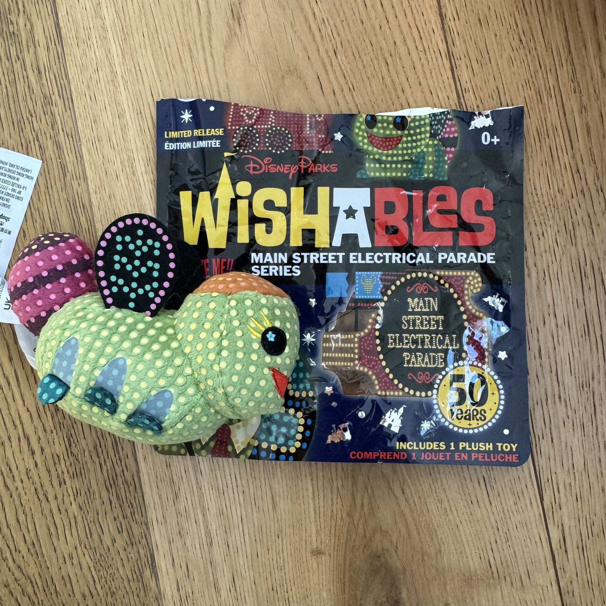 Disney Wishables Mystery Plush Main Street Electrical Parade Lightning Bug Float