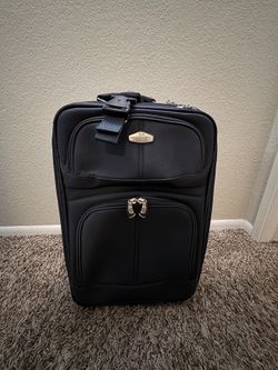 Carry On Ricardo Beverly Hills Brand Blue Suitcase